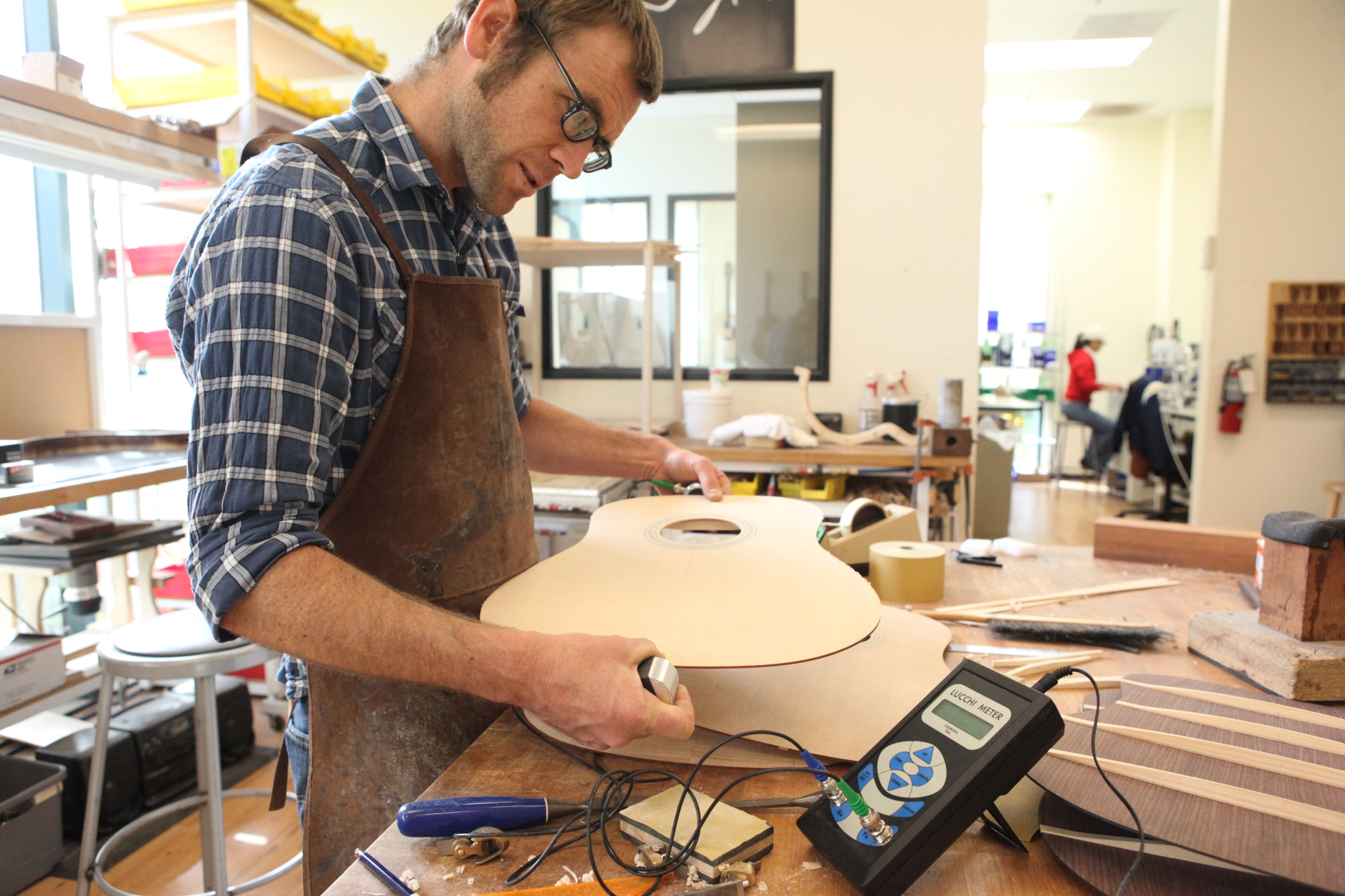Andy Powers (Taylor Guitars) measures a guitar top with the LucchiMeter